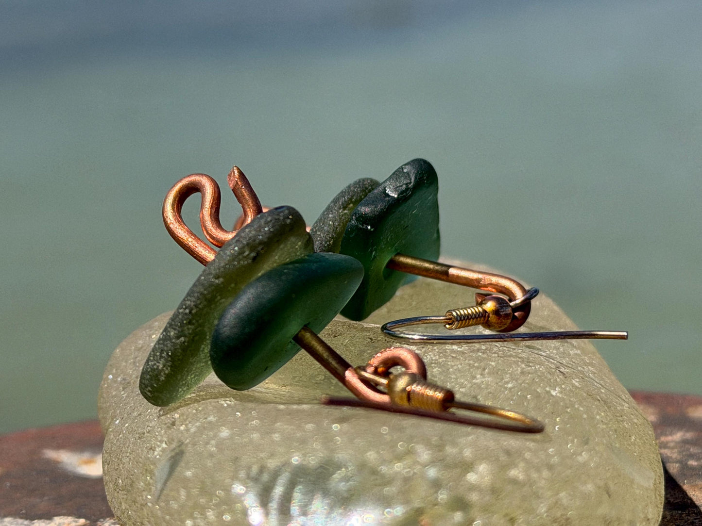 Handmade green sea glass on recycled copper. Unique earrings, ethical jewellery, unusual jewellery, eco friendly jewellery. Quirky jewellery