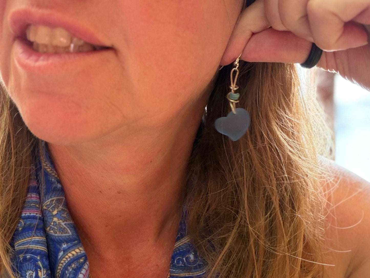 Blue glass heart earrings on recycled sterling silver. Eco conscious jewellery. Ethical jewellery. Blue glass hearts. Handmade earrings