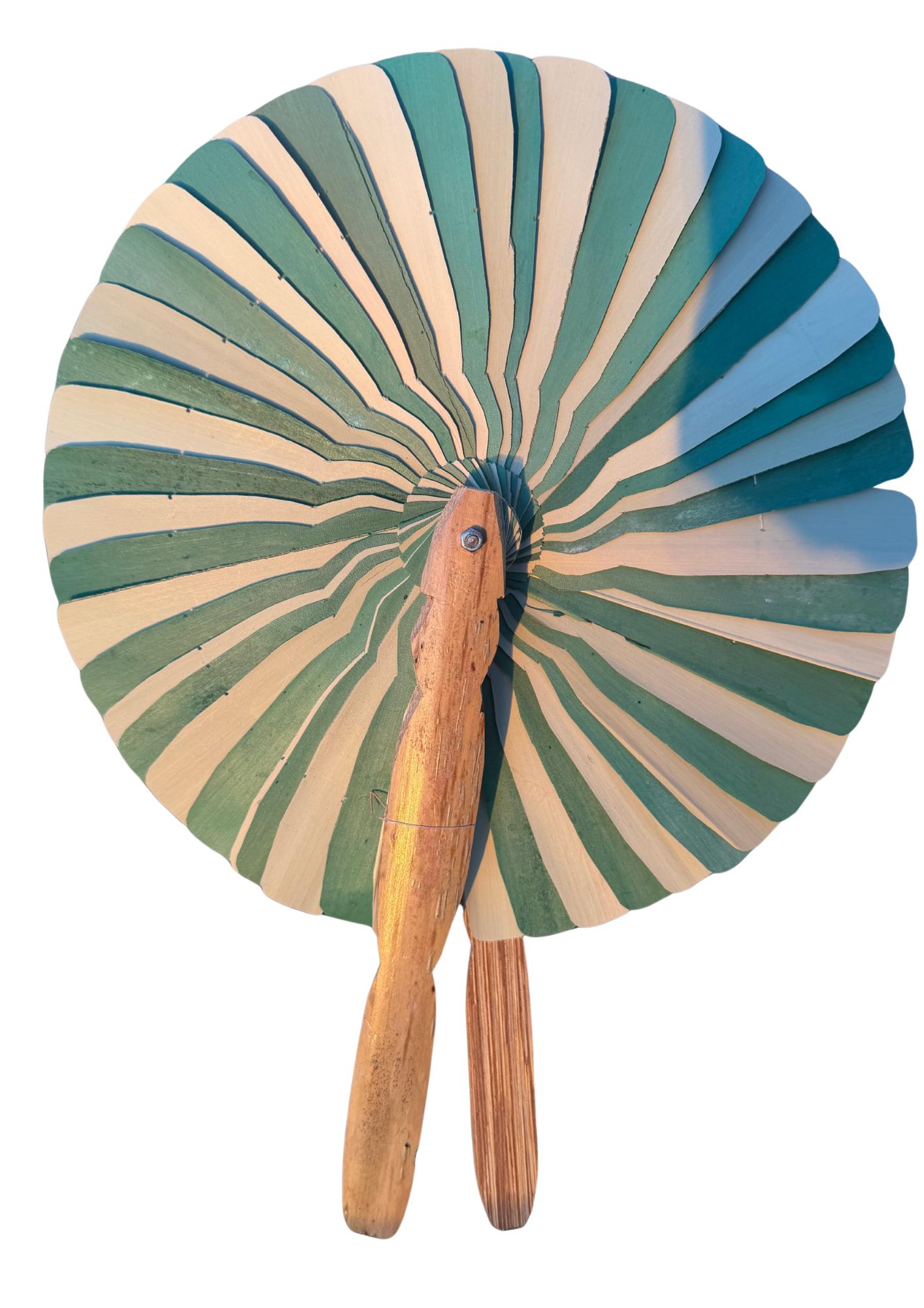 Absolutely beautiful eco friendly handheld bamboo fans. A wide range of colours. Large handmade fans. Eco gifts. Red, orange, green, purple.