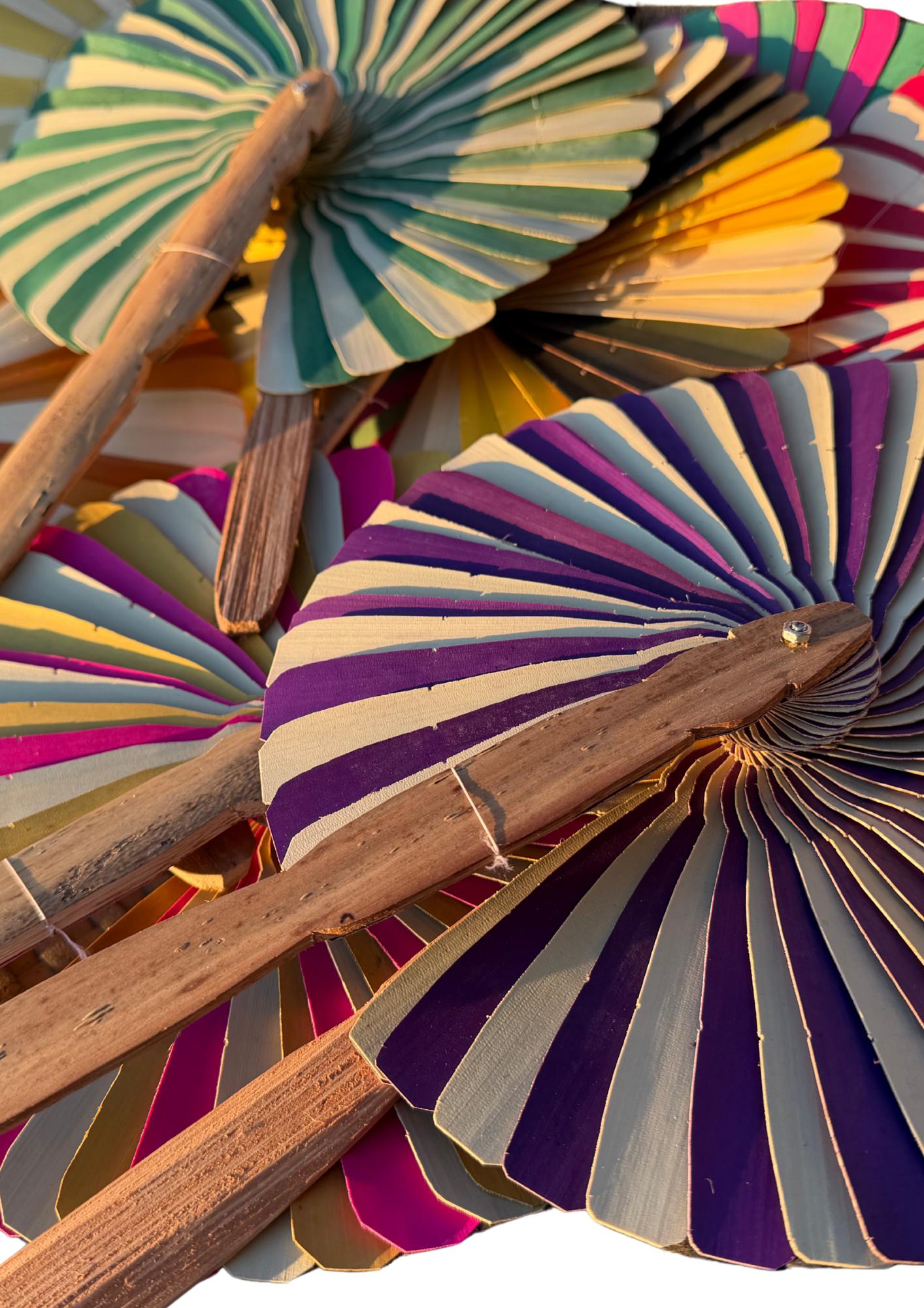 Absolutely beautiful eco friendly handheld bamboo fans. A wide range of colours. Large handmade fans. Eco gifts. Red, orange, green, purple.