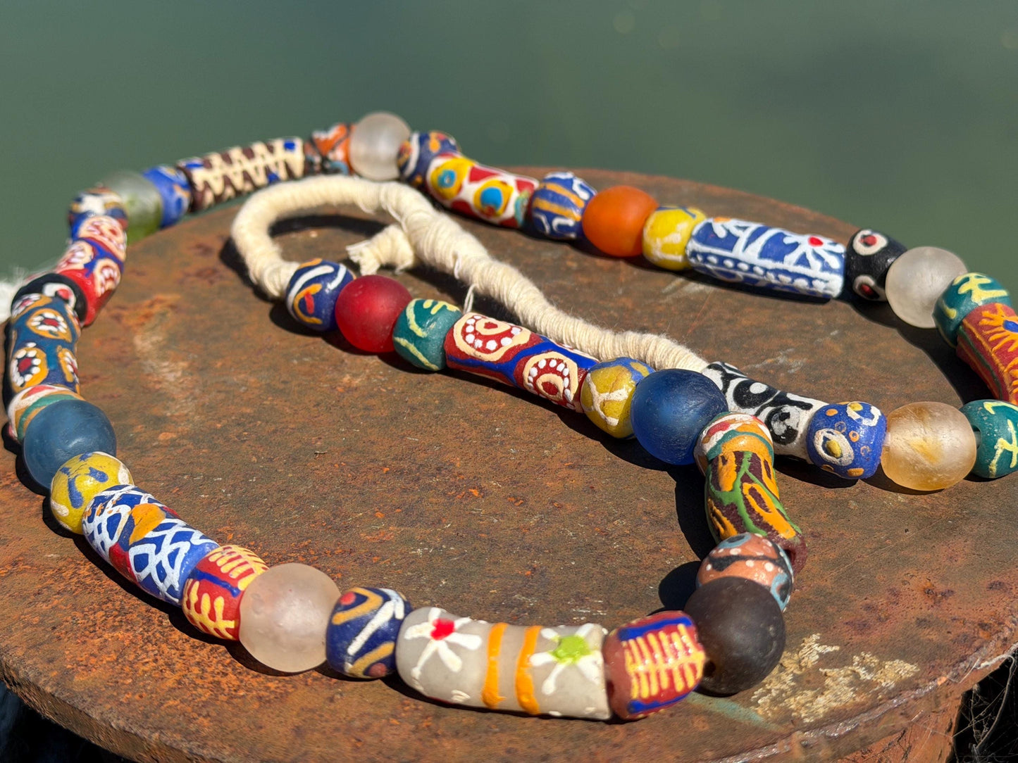 Fabulous hand painted glass necklaces. Recycled necklace, handmade bead necklace. Eco friendly jewellery. Ethical and sustainable gift.
