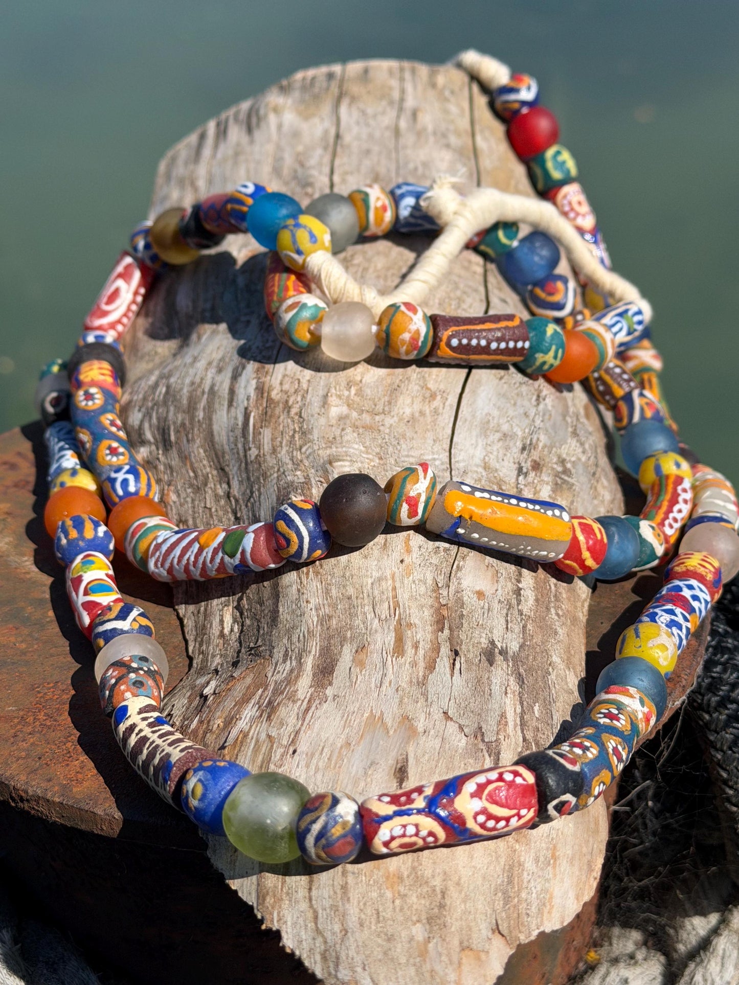Fabulous hand painted glass necklaces. Recycled necklace, handmade bead necklace. Eco friendly jewellery. Ethical and sustainable gift.