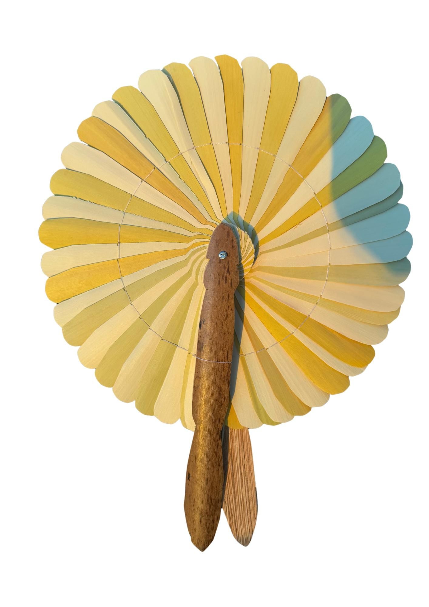 Absolutely beautiful eco friendly handheld bamboo fans. A wide range of colours. Large handmade fans. Eco gifts. Red, orange, green, purple.