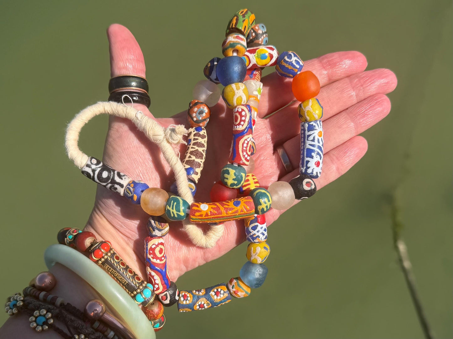 Fabulous hand painted glass necklaces. Recycled necklace, handmade bead necklace. Eco friendly jewellery. Ethical and sustainable gift.