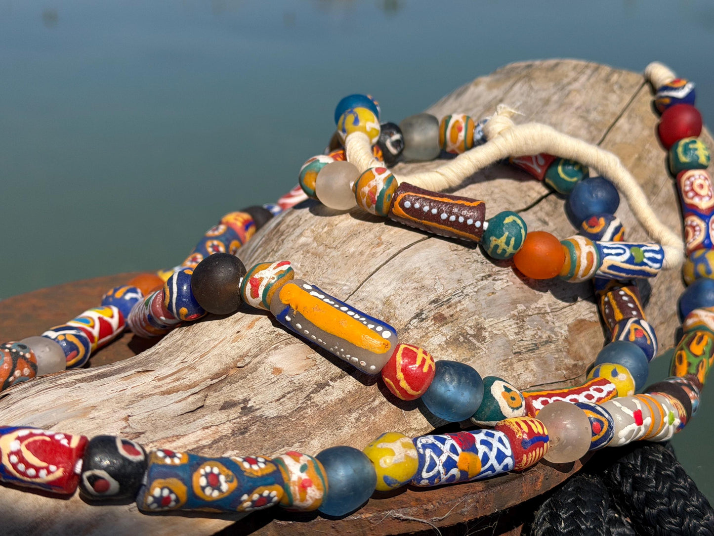 Fabulous hand painted glass necklaces. Recycled necklace, handmade bead necklace. Eco friendly jewellery. Ethical and sustainable gift.